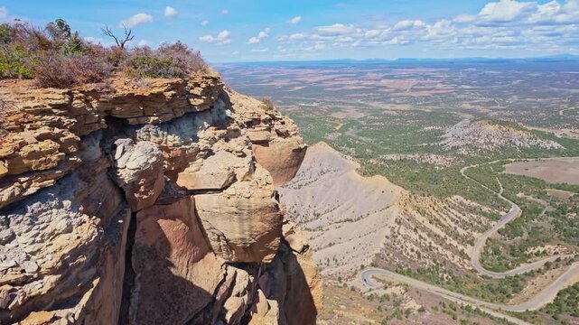 Expansive panoramic vista overlooks the sprawling Montezuma Valley plains from the towering summit of Point Lookout in Colorado