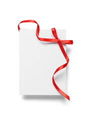 Obraz premium Blank card with red bow on white background