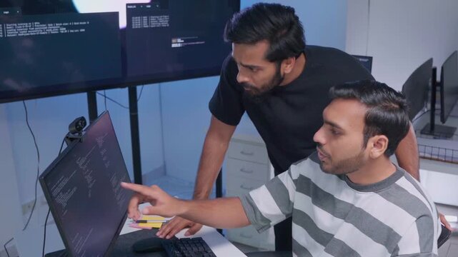 Team engineers software development are brainstorming using computer writing code. Programmer teamwork meetings using technology artificial intelligence work system about cyber security and coding