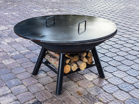 Portable Metal Fire Pit with Lid and Wood Rack for Garden and Patio