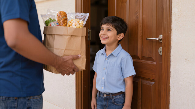 Happy Indian Boy Receiving Grocery Delivery Bag at Front Door of House