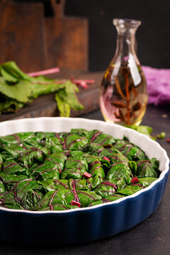 Rustic Beet Leaf Dolma with Olive Oil and Fresh Greens
