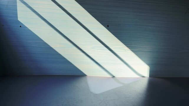 Moving shadows cast through the windows of a train onto the interior, creating an abstract pattern of light and shade during a journey
