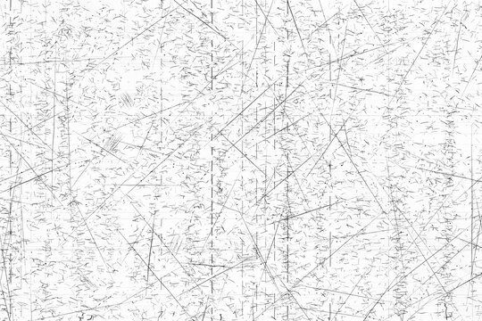 Distressed photocopy texture with grainy noise and scratch marks on white