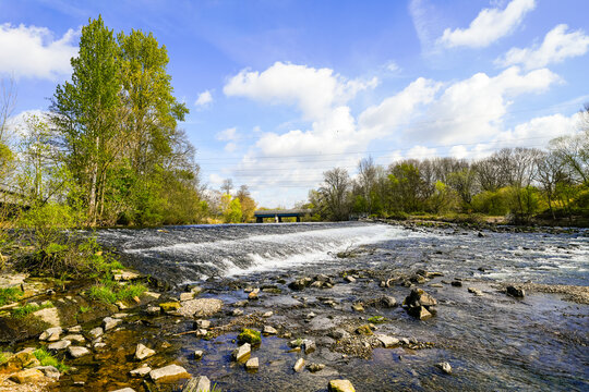 View of the Agger weir and the surrounding landscape near Troisdorf. Nature by the river.
