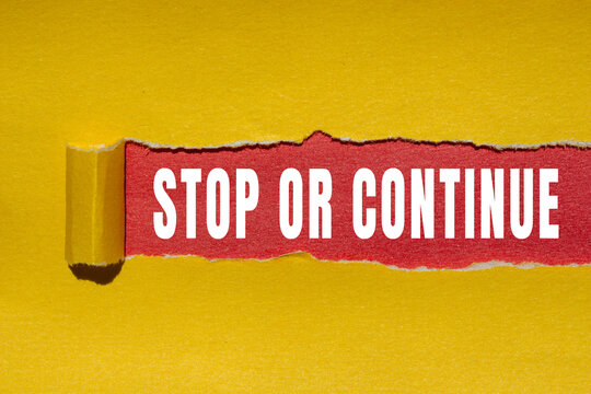 Stop or Continue text concept photo
