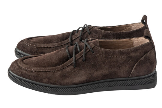 Pair of Brown Suede Casual Shoes isolated on white background