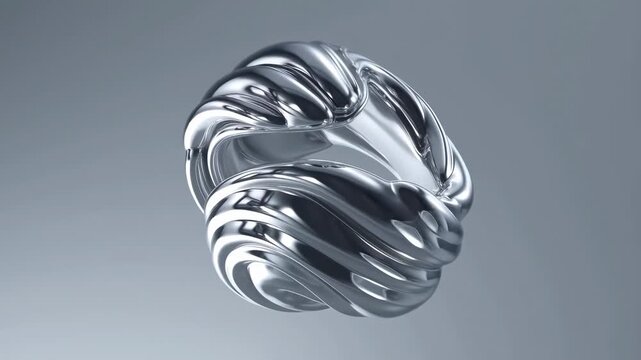 Smooth metallic liquid shape rotates and twists with fluid curves against a gradient gray background. Rotating motion creates reflective surface and visible depth.