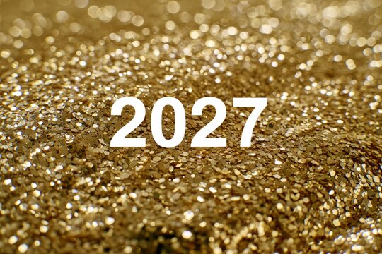 Golden glitter background with year 2027 celebrating future and new year
