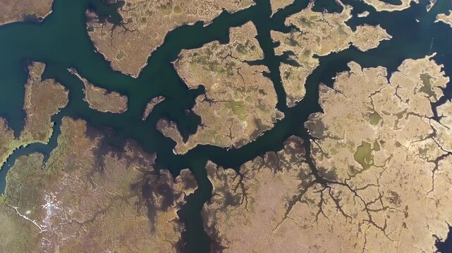 Aerial view of Dalyan delta wetlands in Mugla Turkey shows reeds marshes and lagoon water.