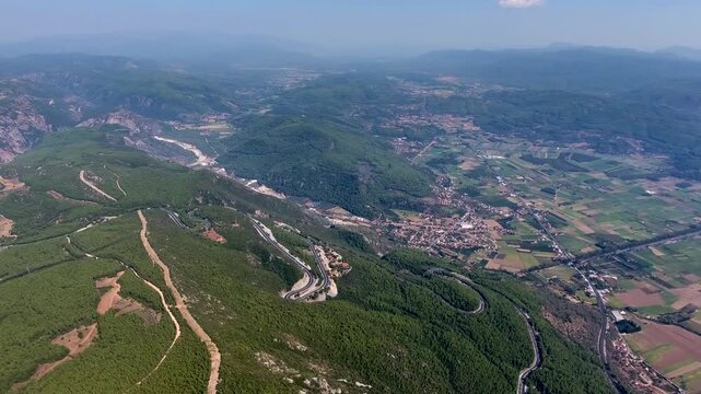 Aerial drone panorama of Akyaka Gokova in Mugla Turkey with delta plain, farms, forest, and sea.