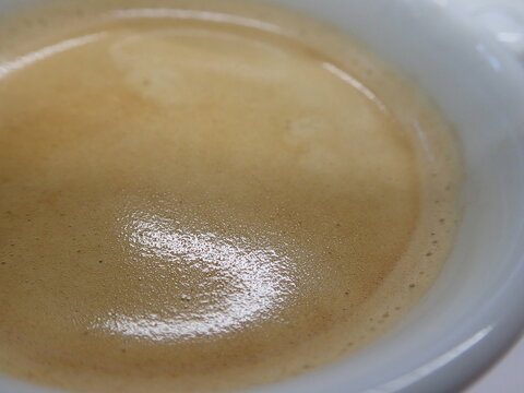 cup of fhresh caffee with cream