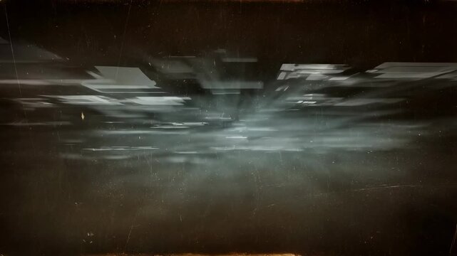 Abstract animation of floating rectangular shapes dispersing with light rays and grainy texture. Abstract animation features floating movement and luminous energy.