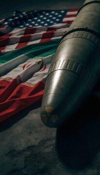 Nuclear Bomb on US and Iran Flags &ndash; Geopolitical Tension and Conflict Concept