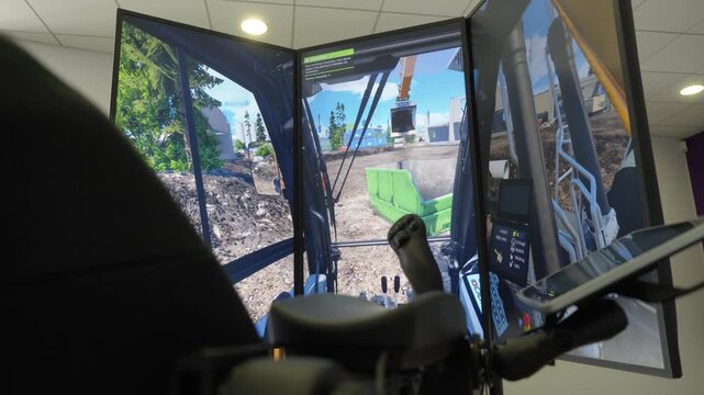 Using a heavy machinery simulator with multi-screen displays for construction training during a public works exhibition in Bordeaux, France.
