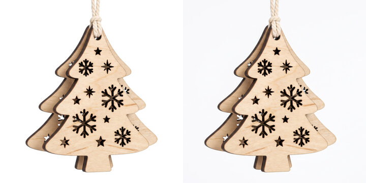 Layered wooden Christmas tree ornament laser cut with snowflake and star patterns in PNG isolated on transparent background