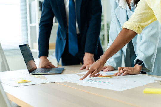 Group of creative Businesspeople brain storm meeting presentation,discussing roadmap to product launch, planning,strategy,dashboard,new business development,working with new startup project in office
