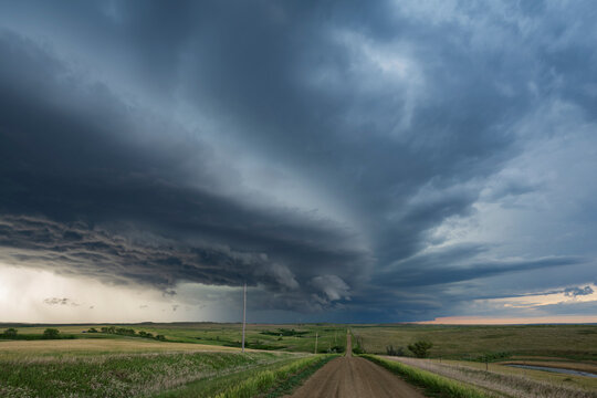 Storm cloud formation over Country Road in south dakota Great Plains