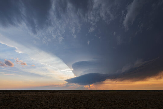 Storm clouds gathering over prairie at sunset in olney springs