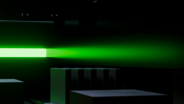 Green laser beam projecting in dark room