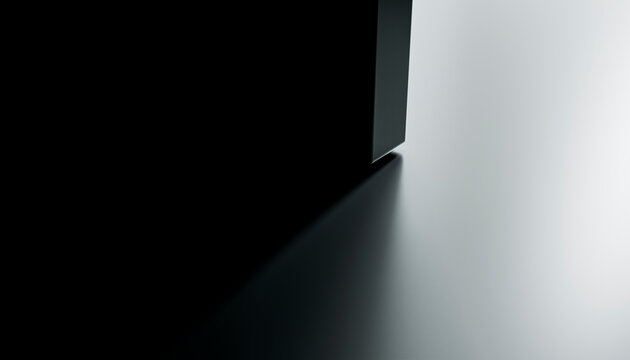 Shadow cast by black rectangular object on white surface