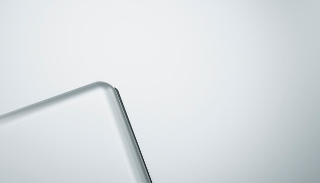 Silver laptop corner on white background