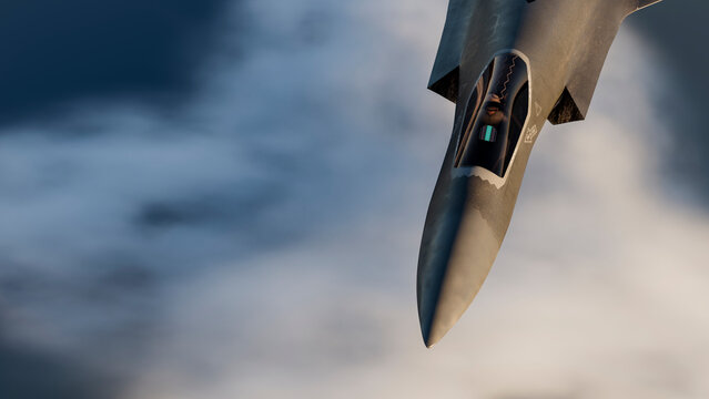 Fighter jet military aircraft flying above clouds in aerial view