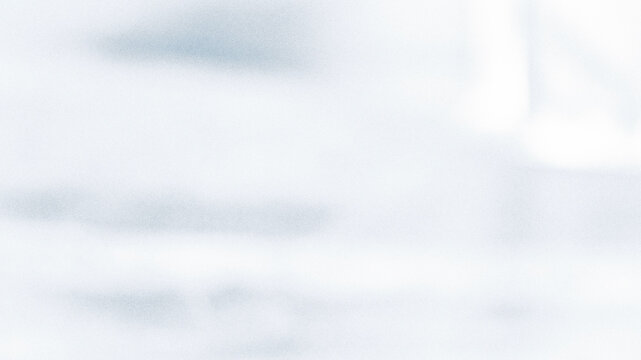 Snow covered ground with blurred winter landscape soft white texture