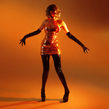 Stage star, woman in gold sequin dress with arms outstretched, looking down, square orange