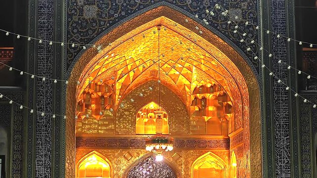 Golden Dome of Allahverdi Khan glows at night with rich yellow reflections and ornate detail.