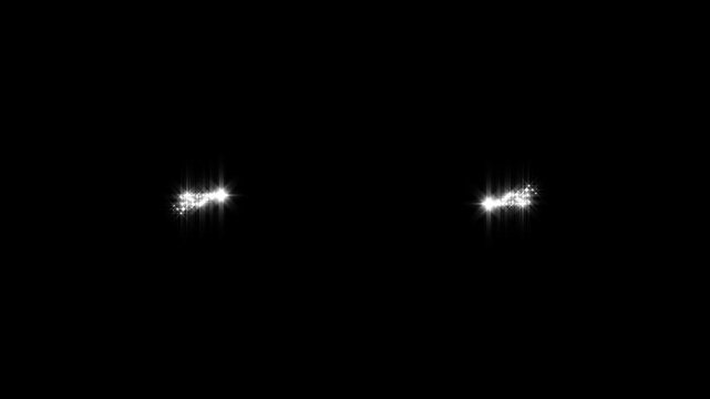 White glitter particle trail with shining stars, fairy dust and glowing light effects creating a smooth magical wave transition and seamless visual background on a black screen.