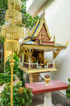 Golden traditional Spirit house, small shrine in the Royal Palace of Cambodia in Phnom Penh