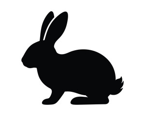 Fototapeta premium A simple black silhouette of a rabbit standing in profile isolated on a plain white background for design