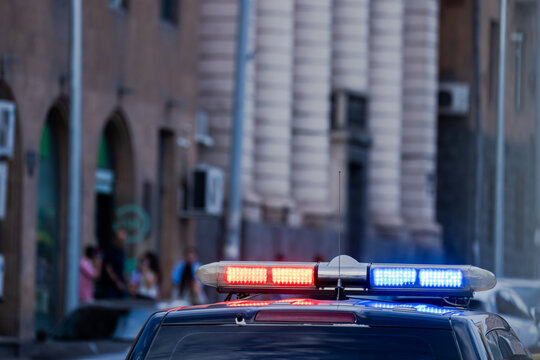 A police car with its lights flashing