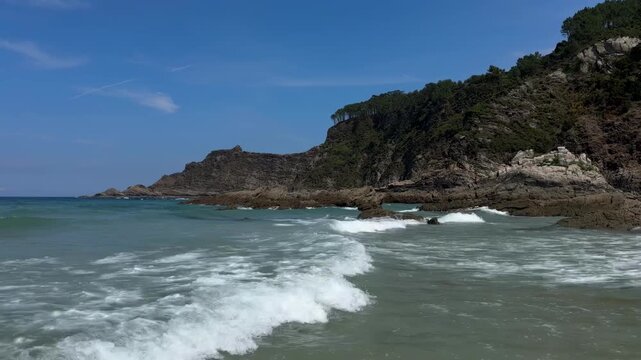 Waves Along Rocky Coastline in Asturias Spain