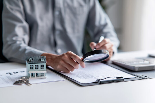 real estate agent with model house selling concept