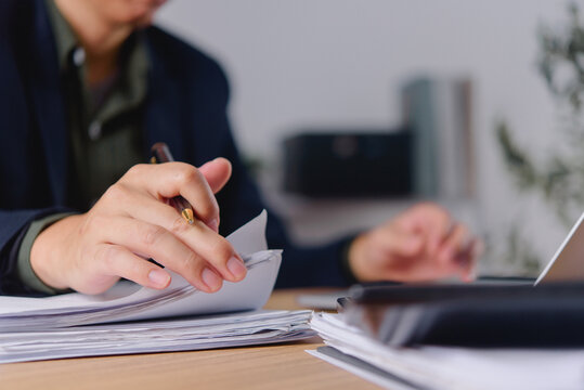 Business Person Writing Documents in Office Workflow