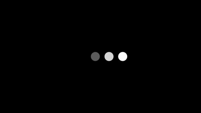 Dots representing a simple loading indicator are displayed on a dark background to convey the concept of waiting for digital content to finalize the process of loading and updating on a computer.
