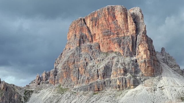 Breathtaking drone perspective of the towering Ra Gusela peak and the dramatic terrain of Passo Giau, located in the Italian Dolomites