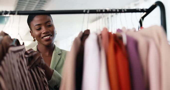 Fashion, choice or woman at clothes rack for shopping, outfit search or sale on garment collection. Happy, black person or browse rail for boutique promotion, wardrobe update or decision for purchase