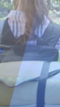Vertical video: Hiker walking path camping, steps showing data, backpack mat showing, camera rising