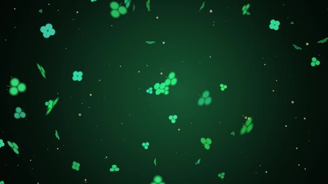 Shamrocks and four leaf clovers tumbling down through gold glitter over a emerald green background, seamless 4K loop