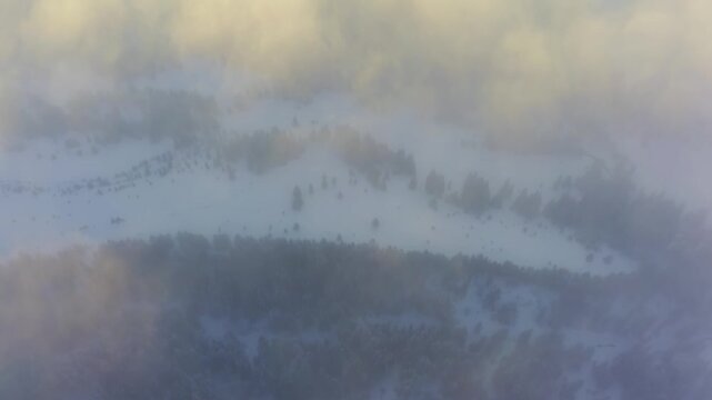 Wonderful view of extraordinary cloudy valley and bright orange sunset