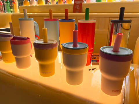 row of reusable cups