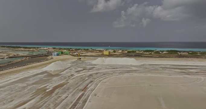 Bonaire Caribbean Netherlands Aerial v52 flyover industrial salt production facility, featuring a channel system for water management and evaporation ponds - Shot with 5k Camera - Feb 3rd 2024