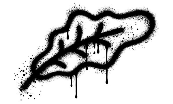 Mustard green leaf graffiti in black spray paint.