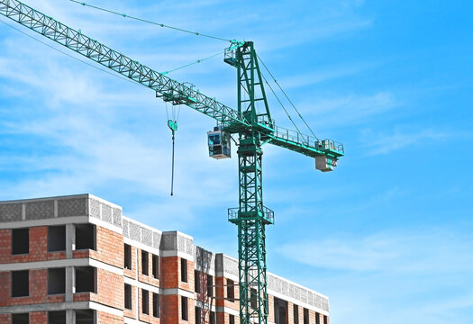 Residential building from red brick under construction