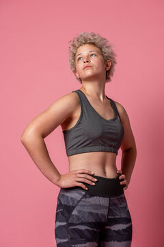 Confident woman in athletic wear