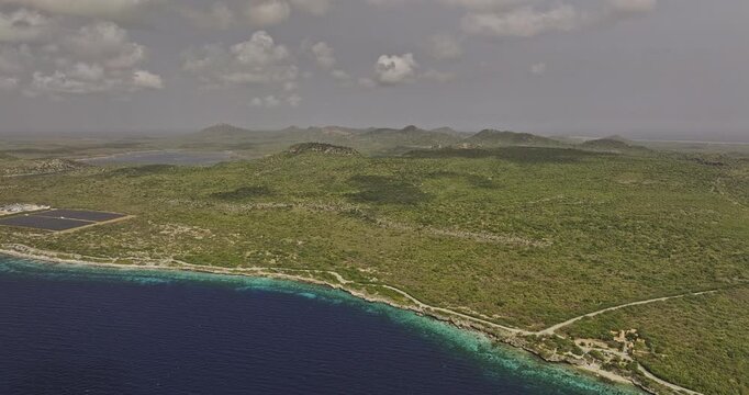 Bonaire Caribbean Netherlands Aerial v65 high flyover capturing hybrid power station, oil transshipment facility and Washington Slagbaai National Park - Shot with 5k Camera - Feb 3rd 2024