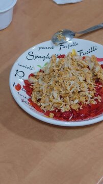 Traditional spanish cod with red peppers dish served on a plate